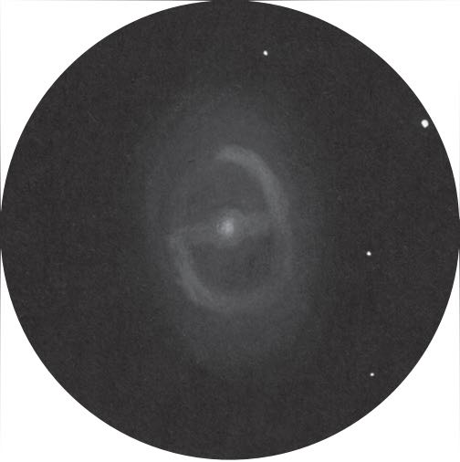 M95 come appare in un telescopio da 400 mm
in condizioni di cielo scuro. Uwe Glahn