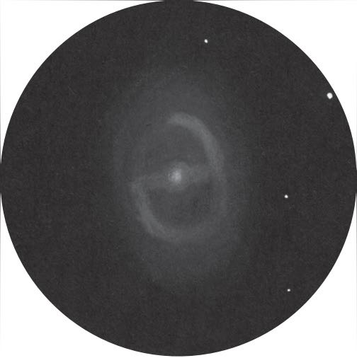 M95 come appare in un telescopio da 400 mm
in condizioni di cielo scuro. Uwe Glahn