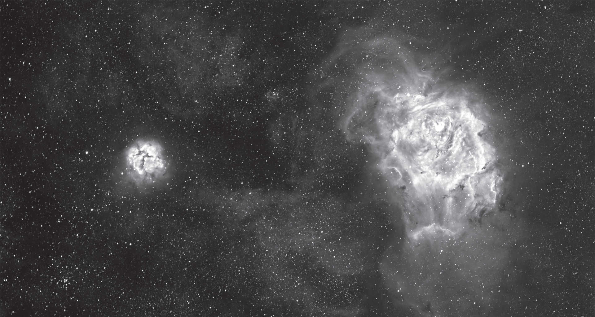 La nebulosa Laguna e Trifida (M8 e M20) nella costellazione del Sagittario. Immagine ottenuta dalla somma di sei scatti con tempo di esposizione di 1 minuto ciascuno, sei scatti da 15 minuti ciascuno e 2 scatti da 60 minuti ciascuno. Camera: SBIG STF-8300, filtro Hα con banda passate di 35 nm, telescopio: rifrattore 130 mm con lunghezza focale di 1000 mm. U. Dittler